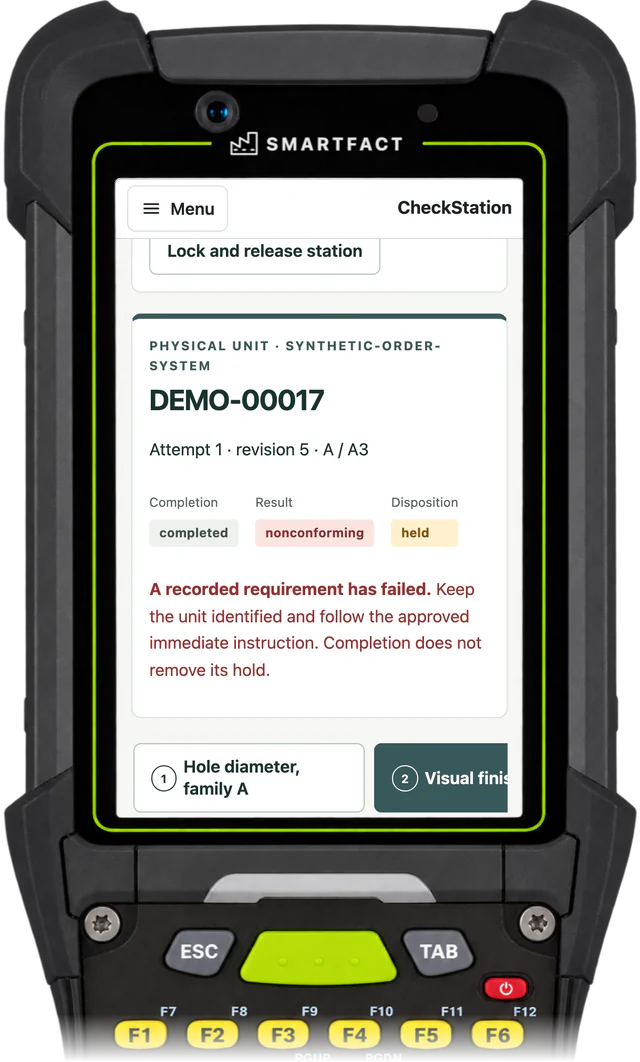 CheckStation station showing the completed inspection of DEMO-00017 with a nonconforming result and a held disposition
